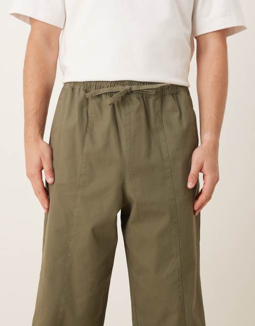 ASOS DESIGN relaxed tapered pull on trousers in khaki, 4 of 5