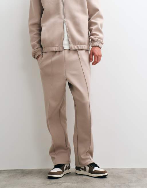 ASOS DESIGN relaxed tapered scuba-style fabric trackies in neutral, 2 of 5