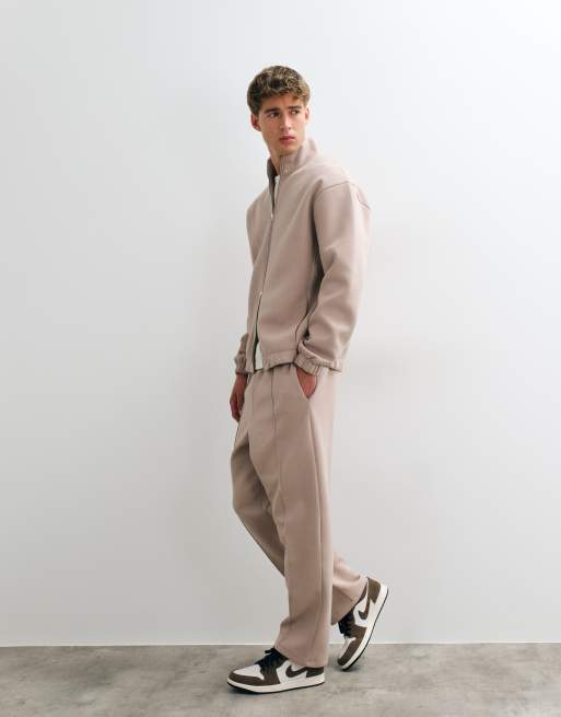 ASOS DESIGN relaxed tapered scuba-style fabric trackies in neutral, 3 of 5