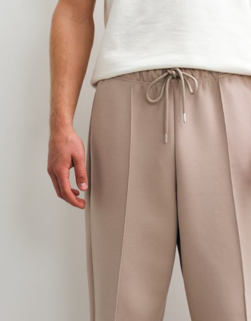 ASOS DESIGN relaxed tapered scuba-style fabric trackies in neutral, 4 of 5