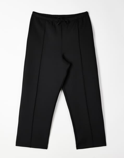 ASOS DESIGN relaxed tapered sweatpants with pin tucks in black - part of a set - view 1