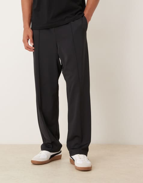 ASOS DESIGN relaxed tapered sweatpants with pintuck detailing in black scuba-style fabric - view 1