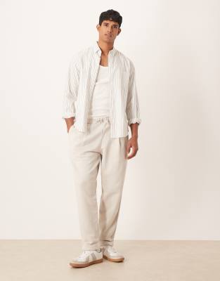Asos Design Relaxed Tapered Sweatpants With Pleats In Neutral