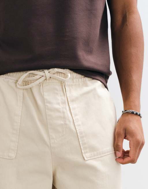 ASOS DESIGN relaxed tapered trouser with fatigue pockets in stone, 3 of 5