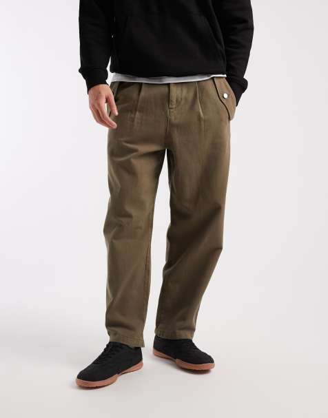 ASOS DESIGN relaxed tapered trousers in khaki with pocket detail