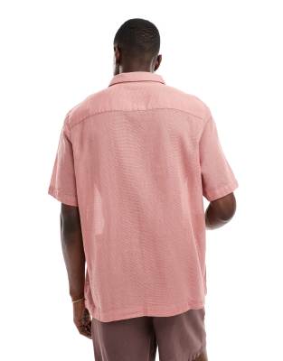 ASOS DESIGN - Chemise décontractée texturée avec poches plaquées - Rose