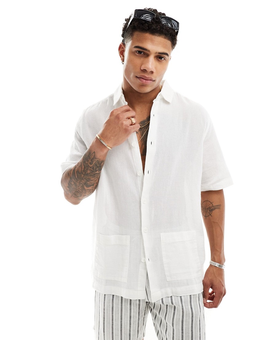 ASOS DESIGN relaxed textured shirt with patch pockets in white
