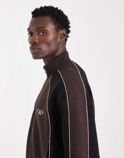 ASOS DESIGN relaxed track jacket with cut & sew panels and prints in brown, 4 of 5