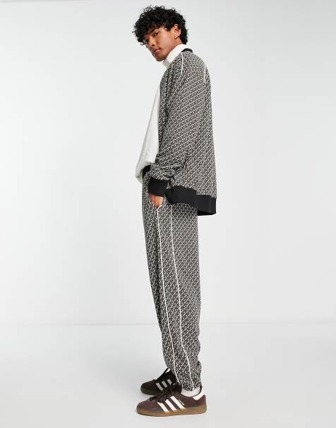 HUGO - Straight-leg tracksuit bottoms with flock-print stacked logos