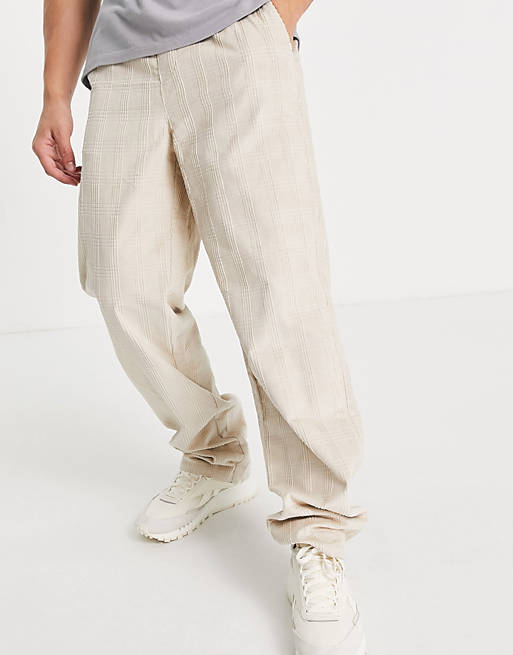 Men relaxed trousers in check cord design 