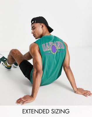 ASOS DESIGN relaxed vest in green with varsity back print