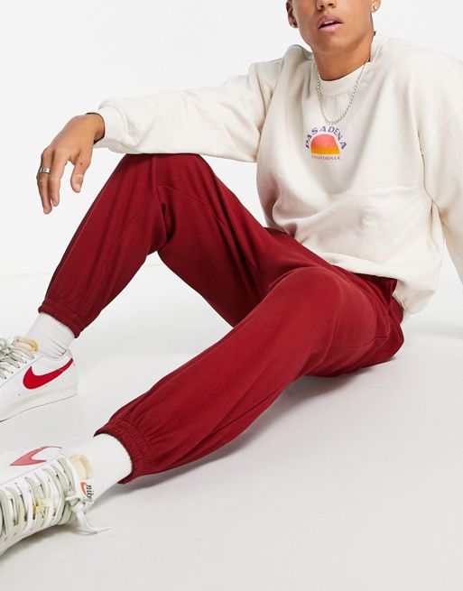 ASOS DESIGN relaxed waffle sweatpants in red - part of a set