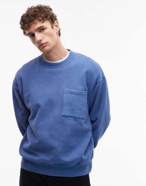 ASOS DESIGN relaxed washed sweatshirt with woven patch in blue - view 1