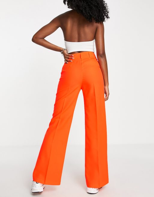 ASOS DESIGN relaxed wide leg flare trousers in orange