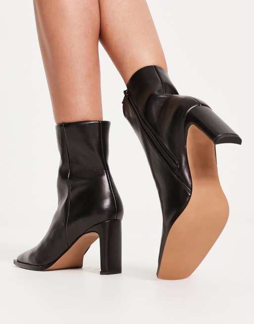 Open back hot sale heeled boots