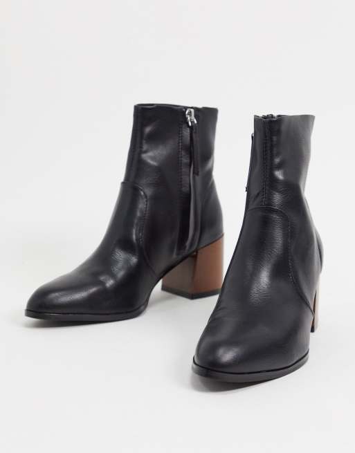 ASOS DESIGN Reporter ankle boots with flared wooden heel in black | ASOS