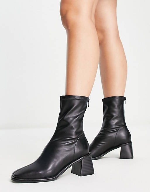 ASOS DESIGN Rescue mid-heeled sock boots in black | ASOS
