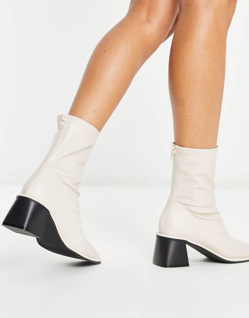 ASOS DESIGN Alliance chunky zip front boots in off-white