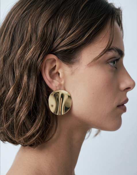 ASOS DESIGN ørestikker med stort hamret ovalt design i guldfarve - view 1