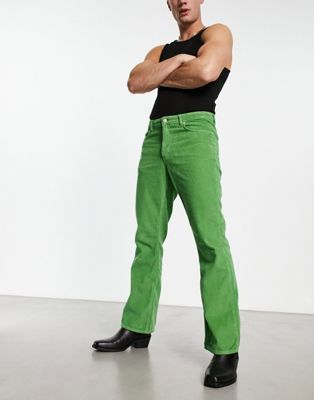 ASOS DESIGN retro bootcut jeans in green corduroy