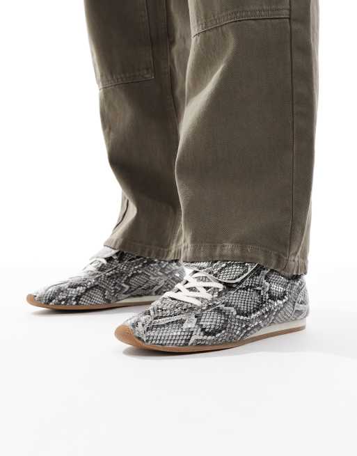 ASOS DESIGN retro sneakers in faux snake print with oversized tongue