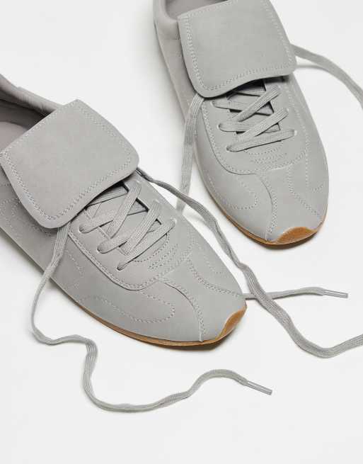 ASOS DESIGN retro sneakers in gray with oversized tongue