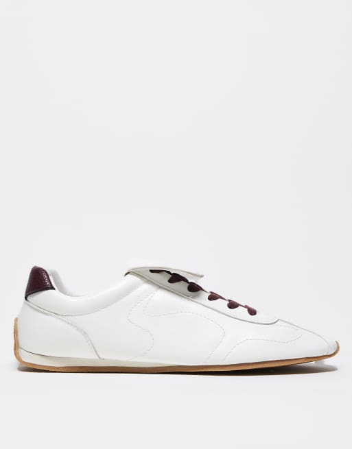 ASOS DESIGN retro sneakers in white with oversized tongues