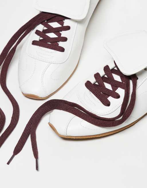 ASOS DESIGN retro sneakers in white with oversized tongues
