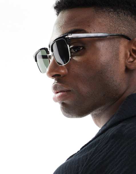 ASOS DESIGN – Retro-Sonnenbrille mit Rahmen in Schwarz und Silber und grün getönten Gläsern - view 1