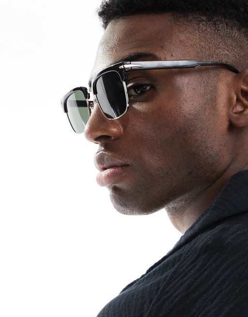 ASOS DESIGN retro sunglasses with black and silver frame and green smoke lens