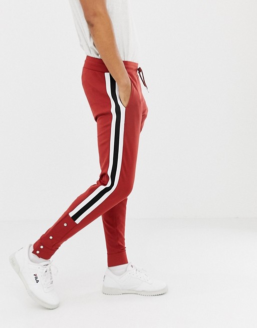 ASOS DESIGN retro track skinny joggers with side stripes and poppers in ...