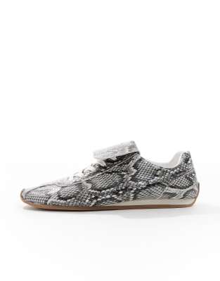  retro trainers in faux snake print with oversized tongue
