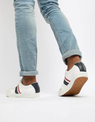 navy and red trainers