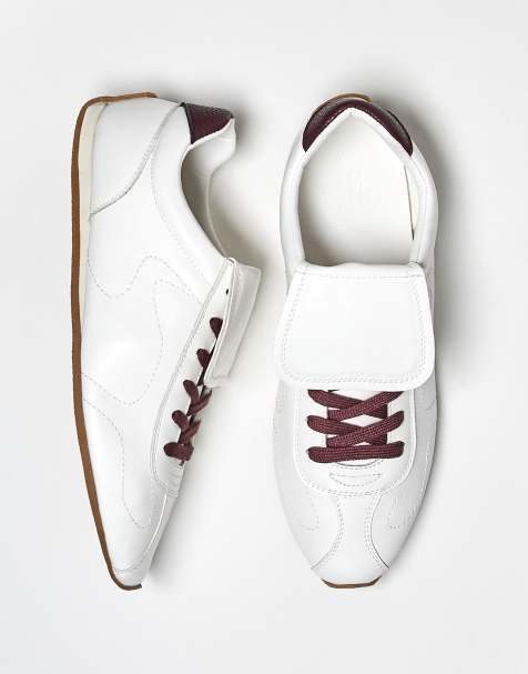 ASOS DESIGN retro trainers in white with oversized tongue - view 1
