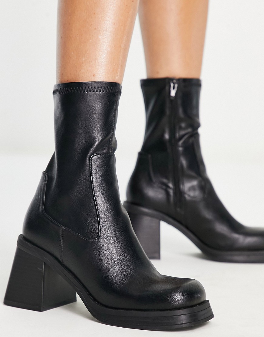 ASOS DESIGN Reversed mid-heel sock boots in black