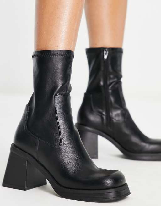 ASOS DESIGN Reversed mid heel sock boots in black