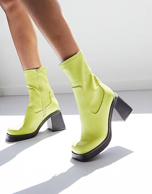 Specified Power cell code ASOS DESIGN Reversed mid-heel sock boots in green | ASOS