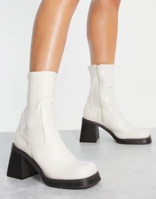 ASOS DESIGN reversed mid-heel sock boots in off white-neutral