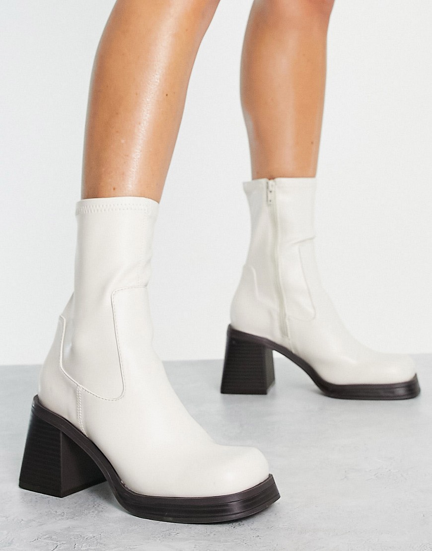 ASOS DESIGN Reversed mid-heel sock boots in off white-Neutral