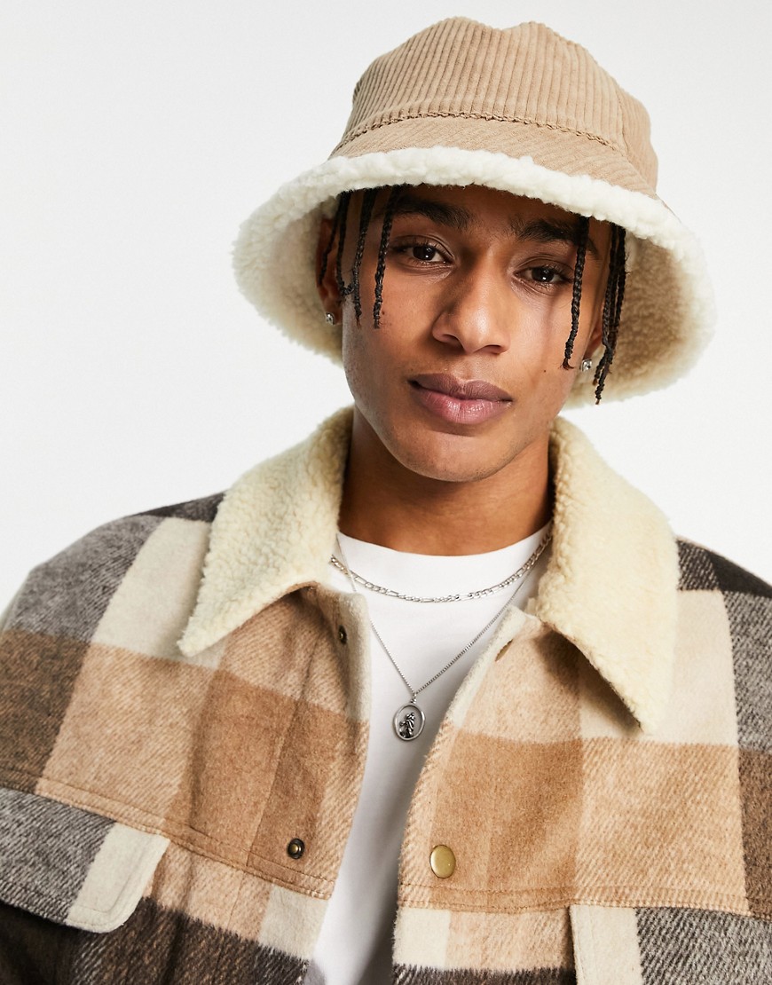 ASOS DESIGN reversible bucket hat in brown cord with sherpa