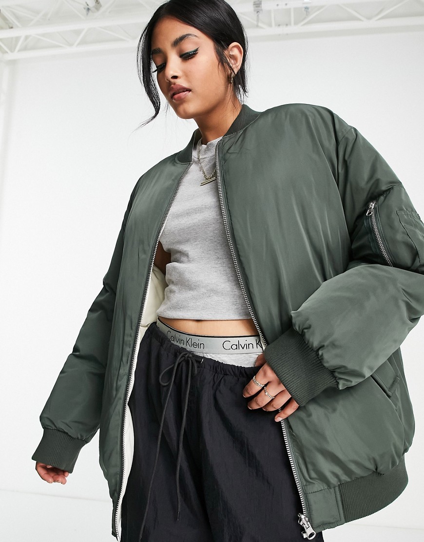 ASOS DESIGN reversible quilted bomber jacket in khaki and cream-Green