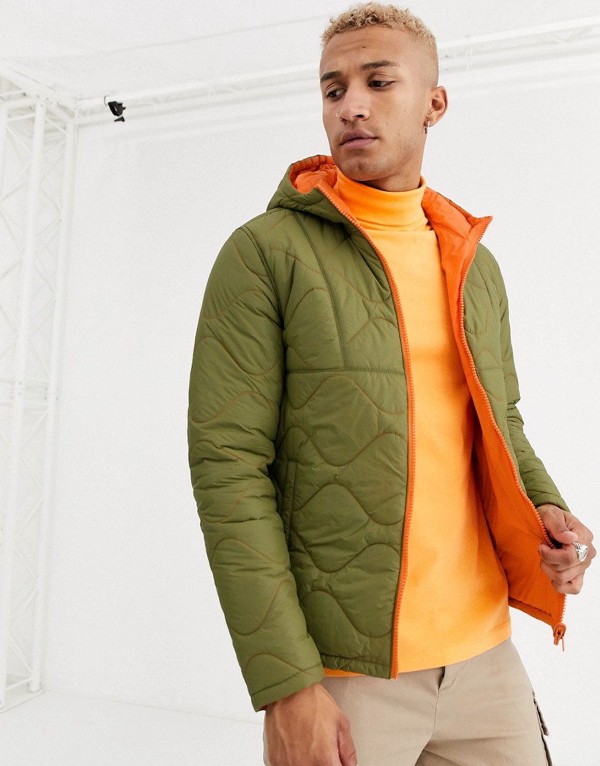 ASOS DESIGN reversible quilted puffer jacket in green with orange stitch