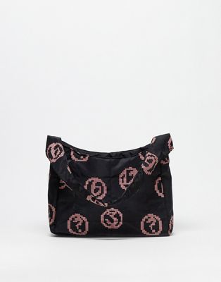 ASOS DESIGN reversible shoulder bag with pink print in black