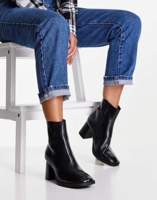 Black heeled store boots asos