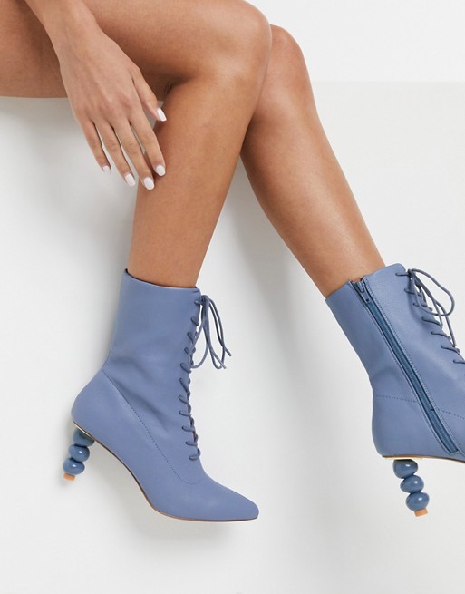 ASOS DESIGN Reward lace up heeled boots with sculptured heel in blue