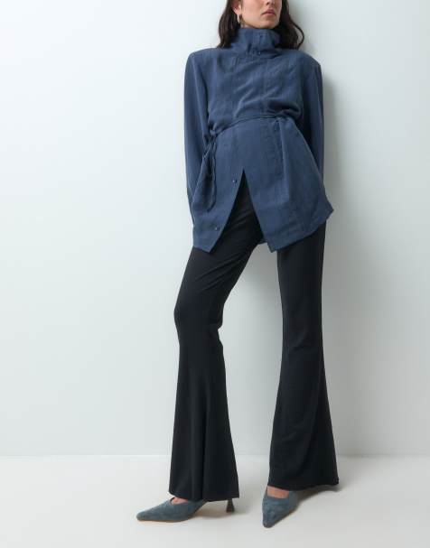 ASOS DESIGN rib flare trouser with lettuce hem in black - view 1
