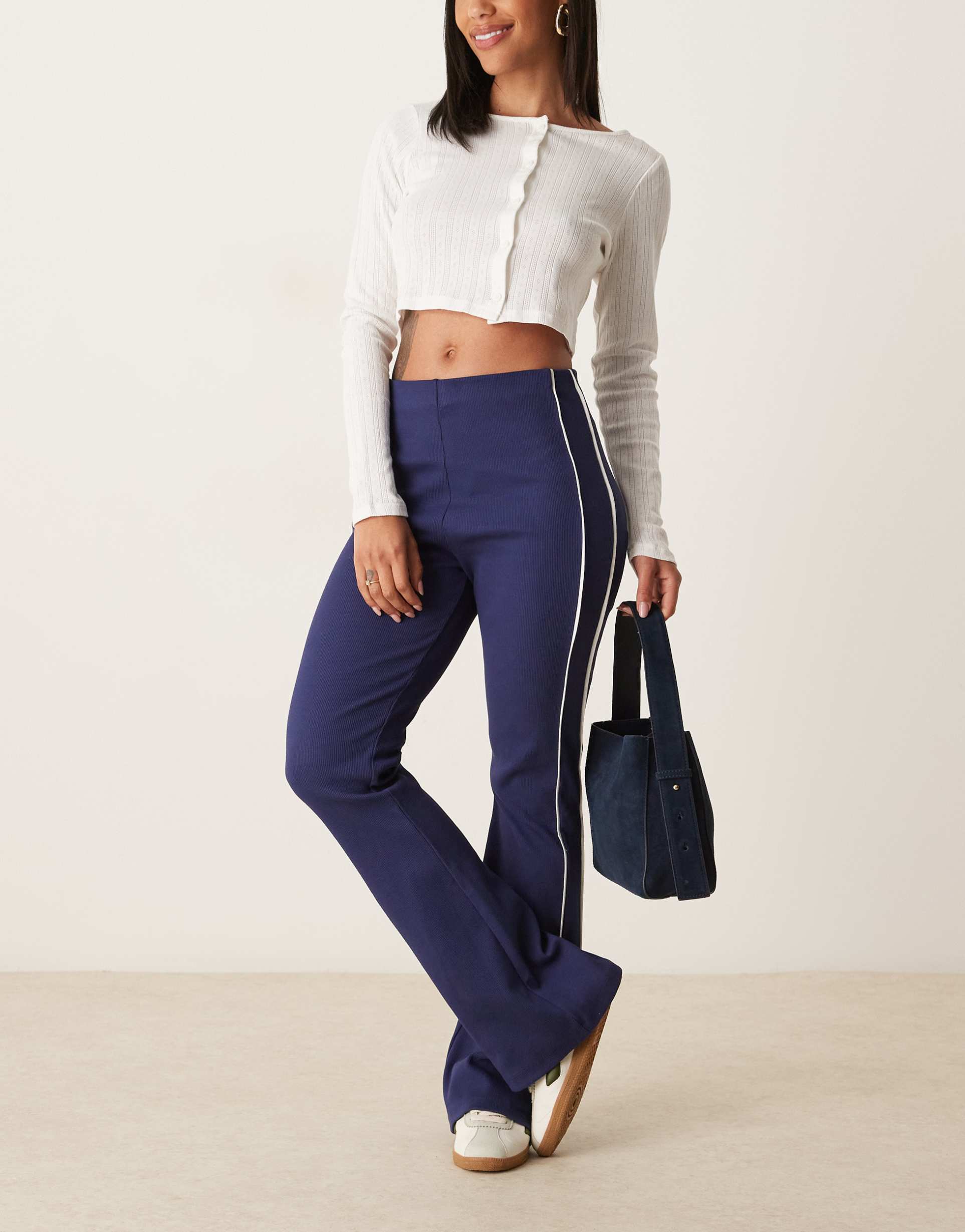 asos design rib knit kick flare pants with piping in navy and cream
