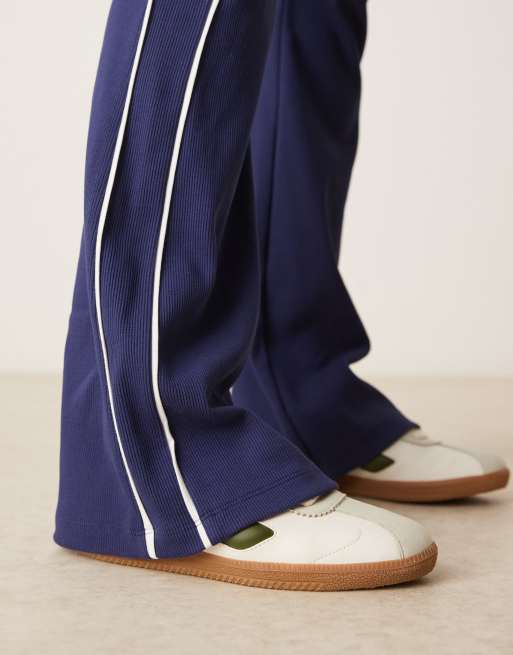 ASOS DESIGN rib knit kick flare pants with piping in navy and cream | ASOS