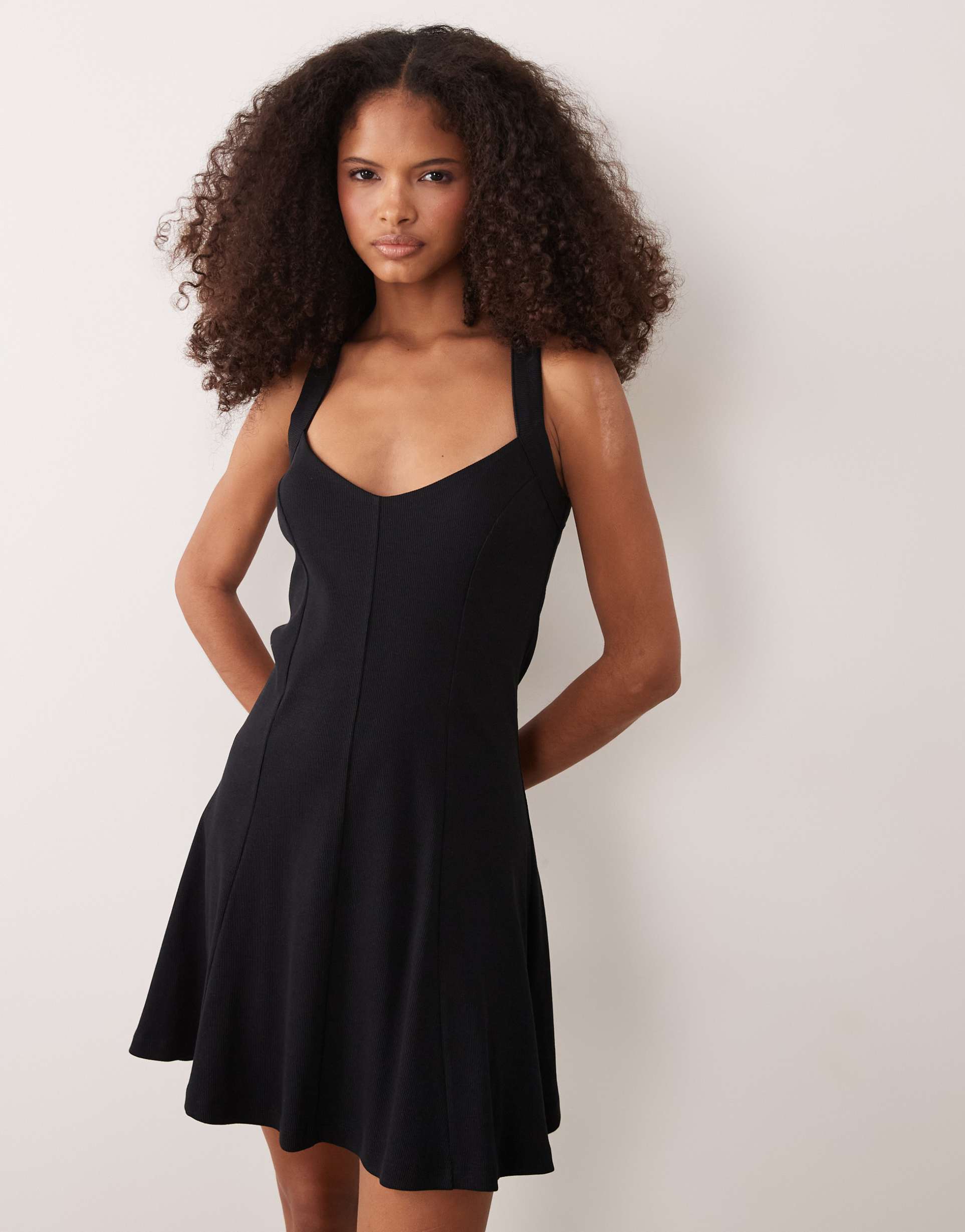 asos design rib knit seam detailing halter mini dress in black