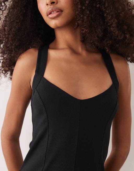 ASOS DESIGN rib knit seam detailing halter mini dress in black, 4 of 4